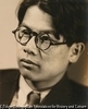 (メガネをかけた男性像)