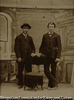 (Portrait of two standing men)