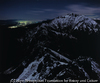 月光に浮かぶ新雪の五竜岳と信濃大町夜景（牛首より）