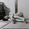 Miss Nahoko K. leaning on the ground of her tatami room. Tokyo