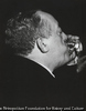Man Drinking from Shot Glass