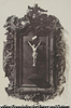 Encadrement en bois sculpté. (Pl. 24)