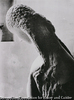 Woman Looking in a Mirror