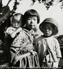 A girl and baby and her brother.