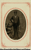 (Portrait of standing man with umbrella)