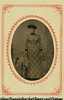 (Portrait of standing lady wearing a hat)
